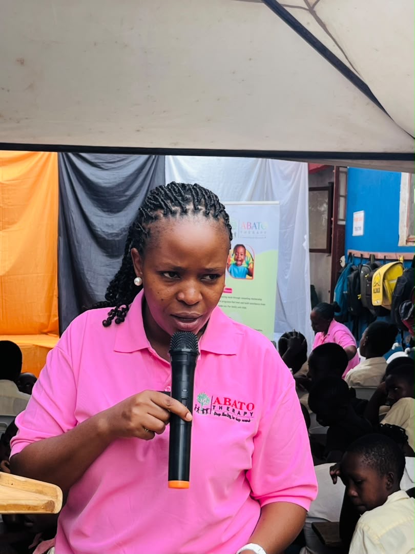 ABATO child specialist speaking during a counselling outreach session